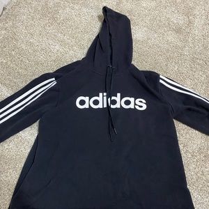 A black adidas cropped hoodie